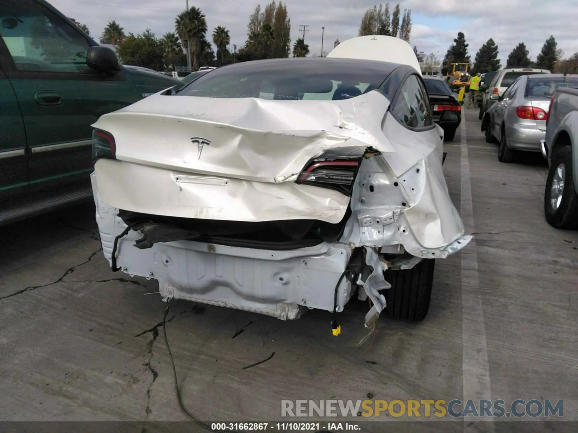 6 Photograph of a damaged car 5YJ3E1EB7MF852903 TESLA MODEL 3 2021