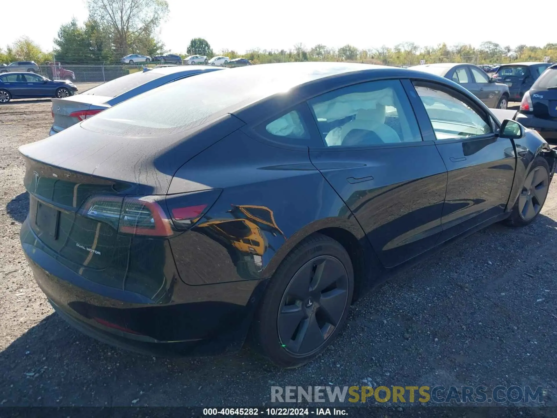 4 Photograph of a damaged car 5YJ3E1EB7MF858460 TESLA MODEL 3 2021