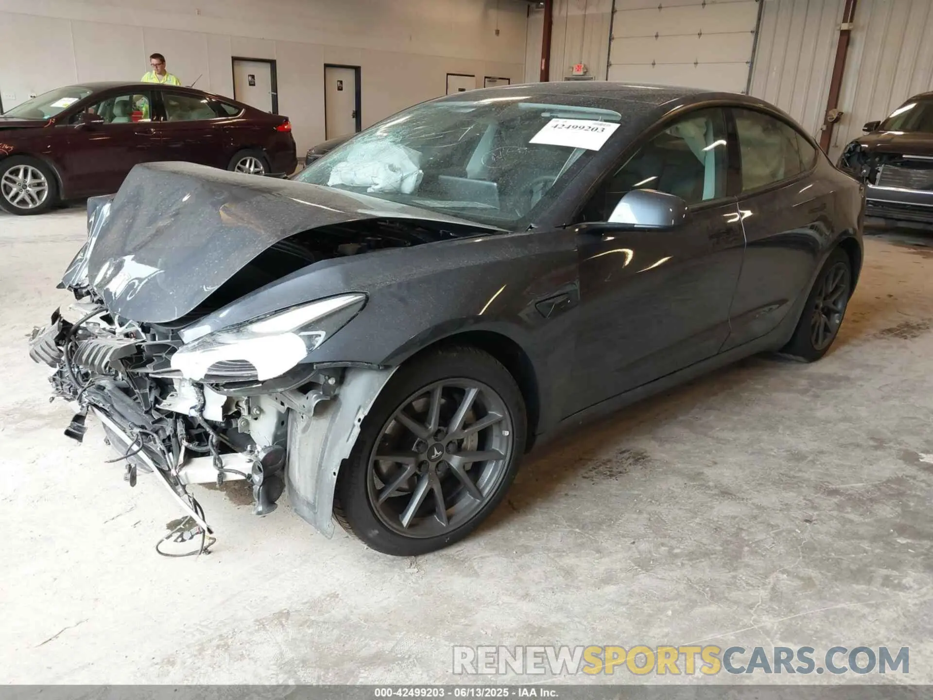 2 Photograph of a damaged car 5YJ3E1EB7MF869300 TESLA MODEL 3 2021