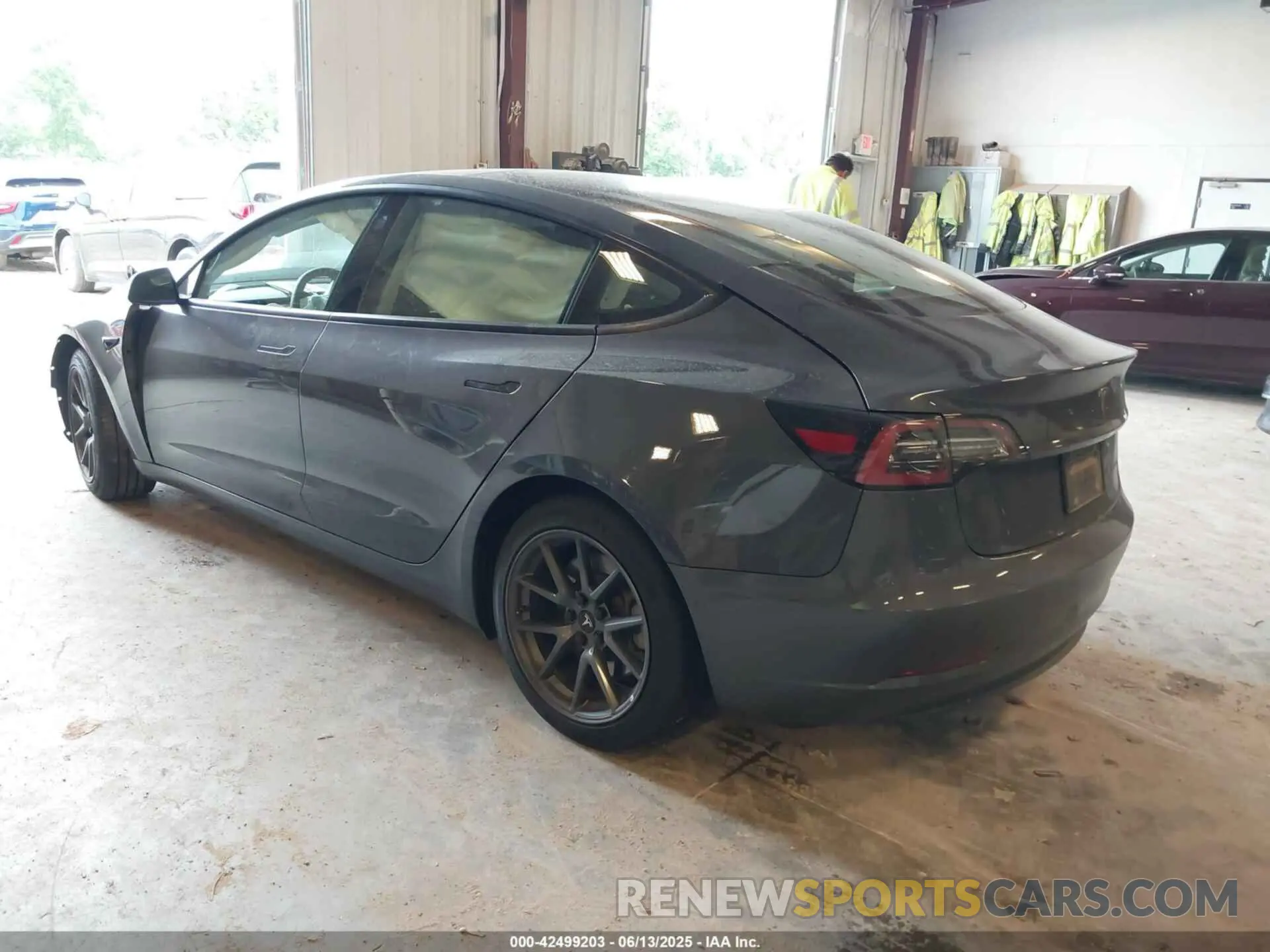 3 Photograph of a damaged car 5YJ3E1EB7MF869300 TESLA MODEL 3 2021