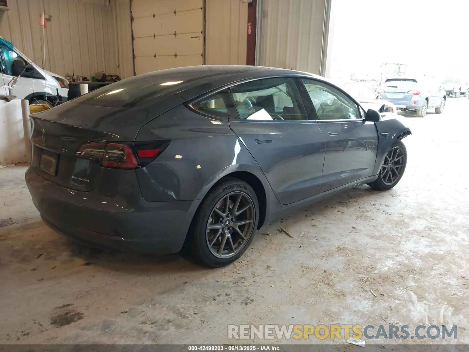 4 Photograph of a damaged car 5YJ3E1EB7MF869300 TESLA MODEL 3 2021