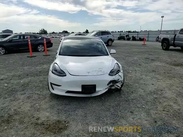 11 Фотография поврежденного автомобиля 5YJ3E1EB7MF874304 TESLA MODEL 3 2021