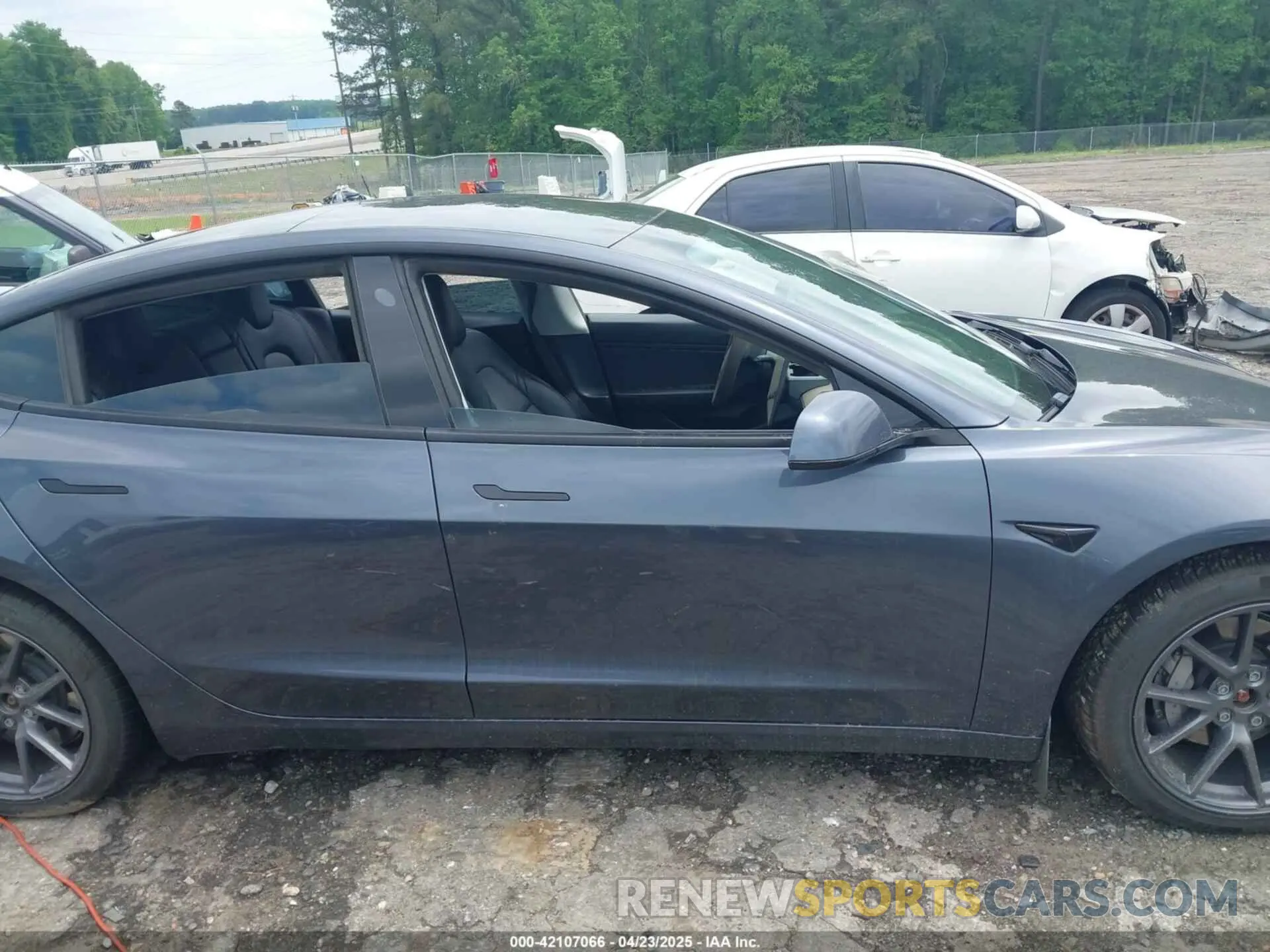 12 Фотография поврежденного автомобиля 5YJ3E1EB7MF923632 TESLA MODEL 3 2021