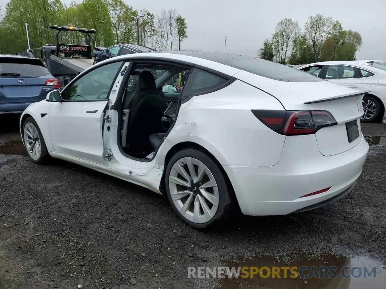 2 Photograph of a damaged car 5YJ3E1EB7MF943718 TESLA MODEL 3 2021