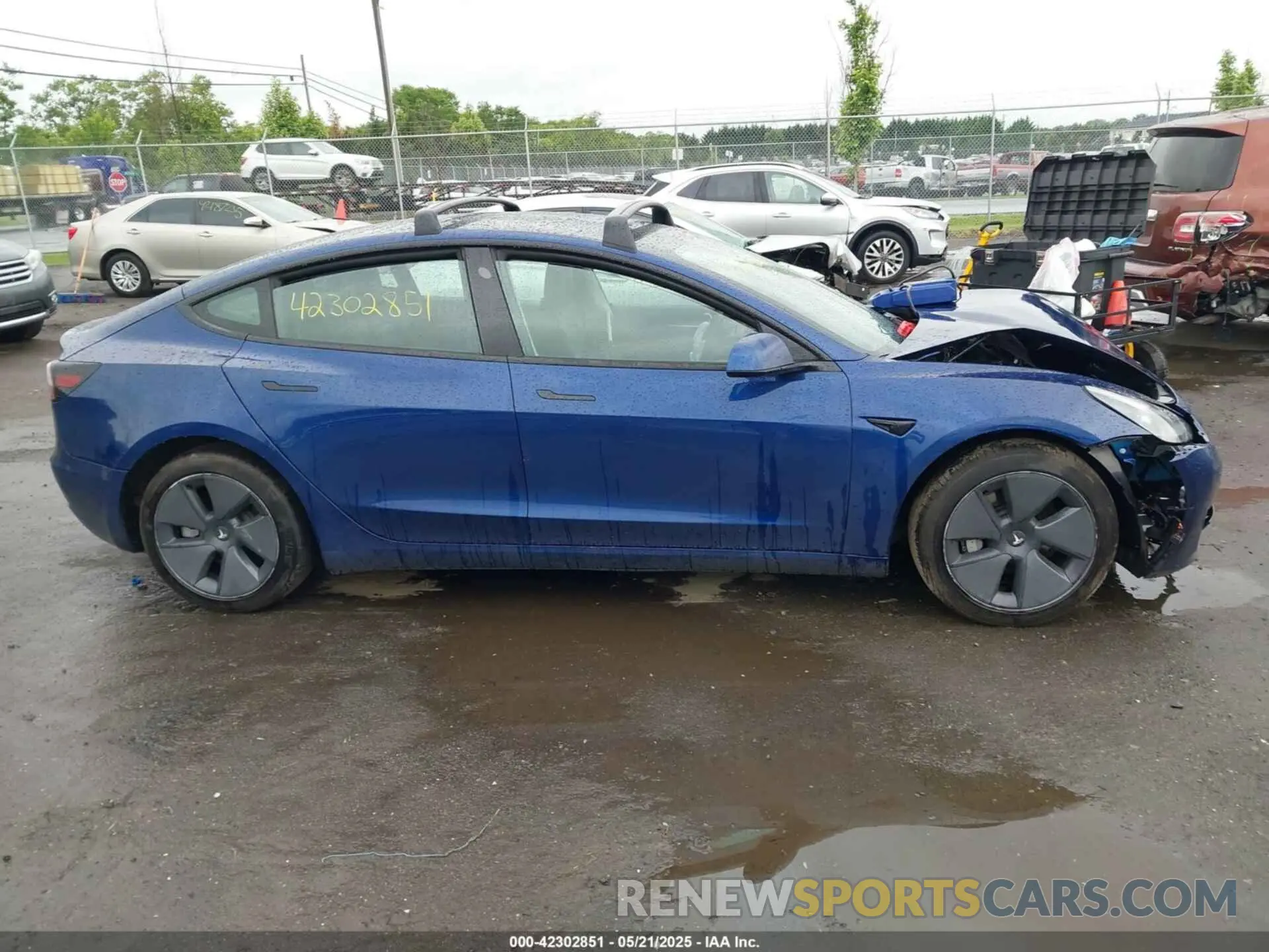 13 Photograph of a damaged car 5YJ3E1EB7MF979876 TESLA MODEL 3 2021