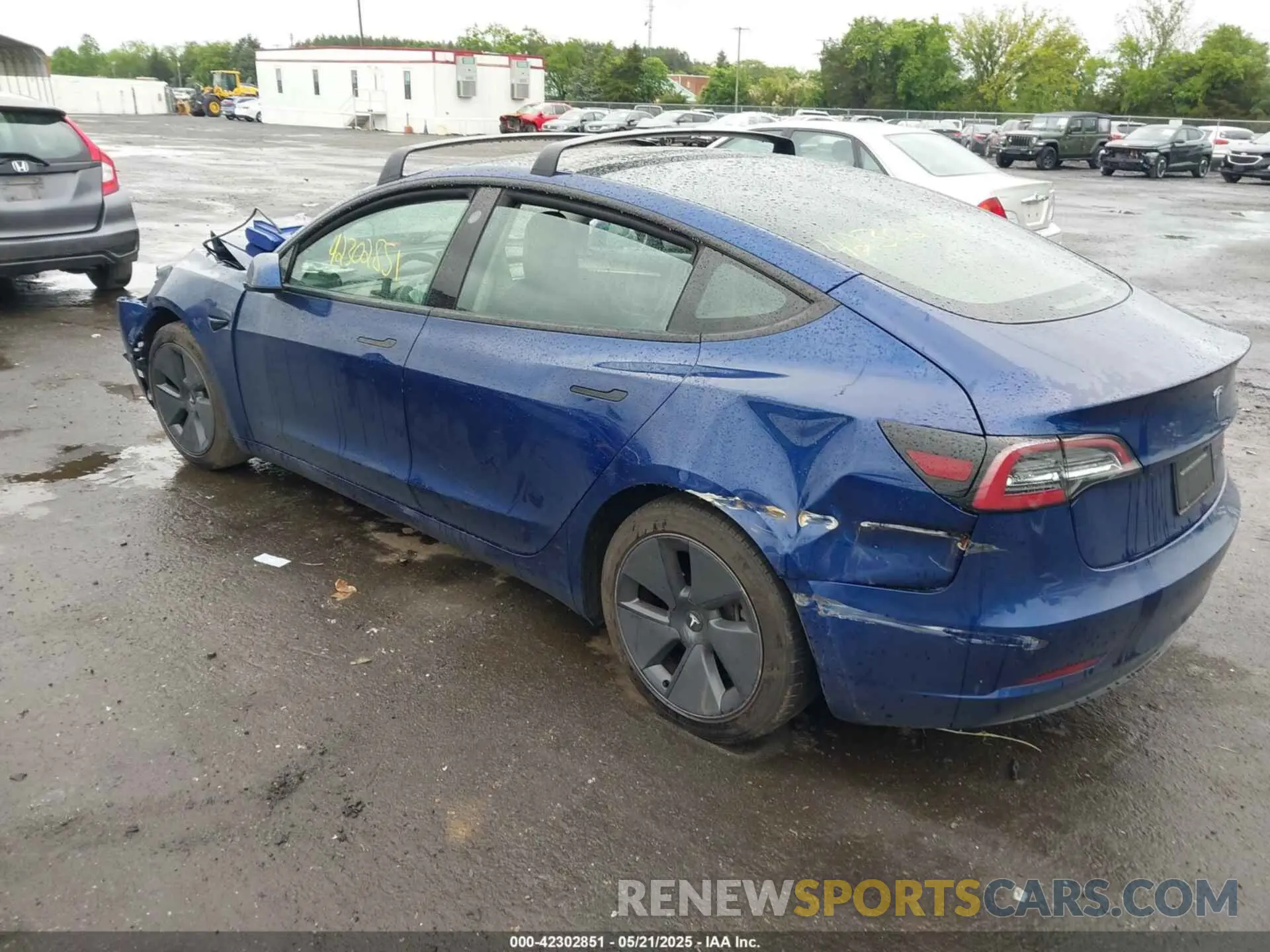 3 Photograph of a damaged car 5YJ3E1EB7MF979876 TESLA MODEL 3 2021