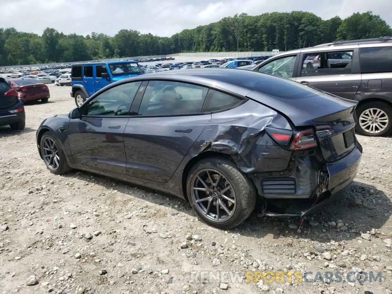 2 Photograph of a damaged car 5YJ3E1EB8MF869399 TESLA MODEL 3 2021