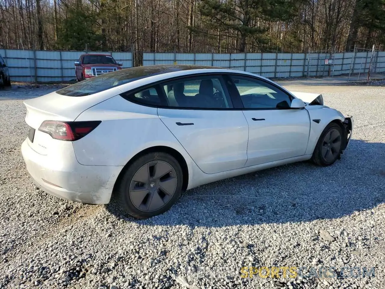 3 Photograph of a damaged car 5YJ3E1EB8MF979997 TESLA MODEL 3 2021