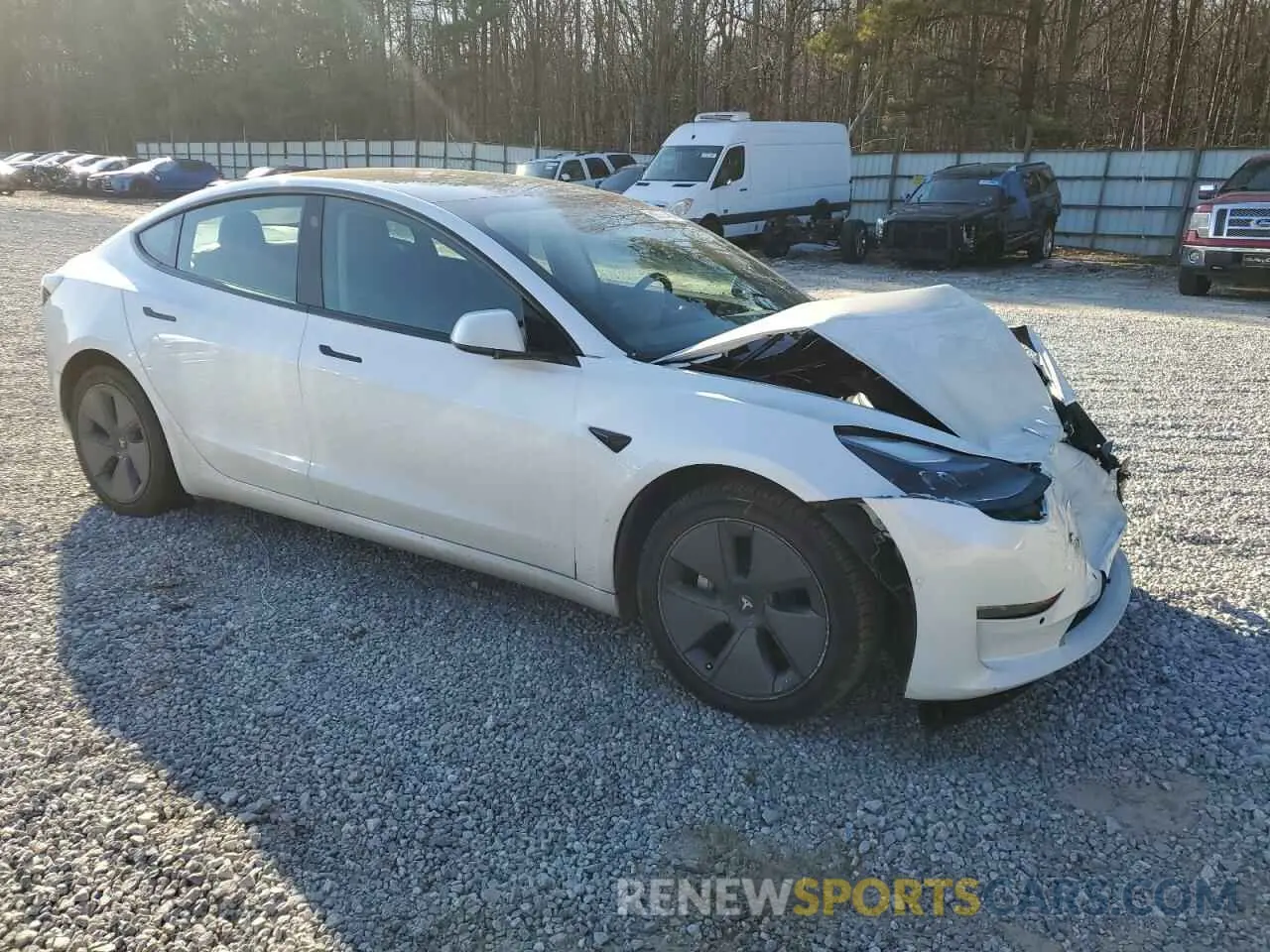 4 Photograph of a damaged car 5YJ3E1EB8MF979997 TESLA MODEL 3 2021