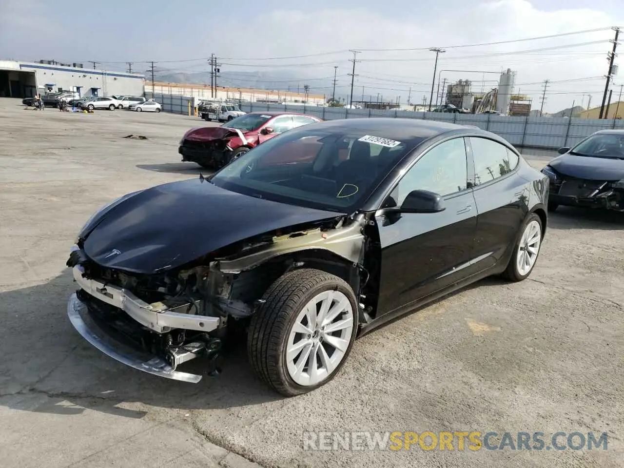 2 Photograph of a damaged car 5YJ3E1EB8MF989977 TESLA MODEL 3 2021