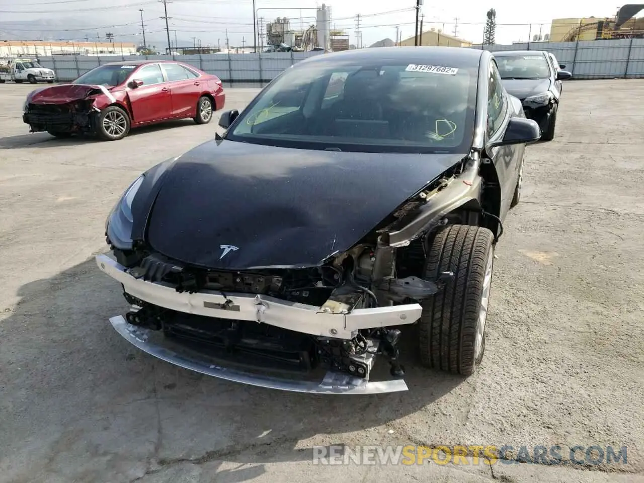 9 Photograph of a damaged car 5YJ3E1EB8MF989977 TESLA MODEL 3 2021