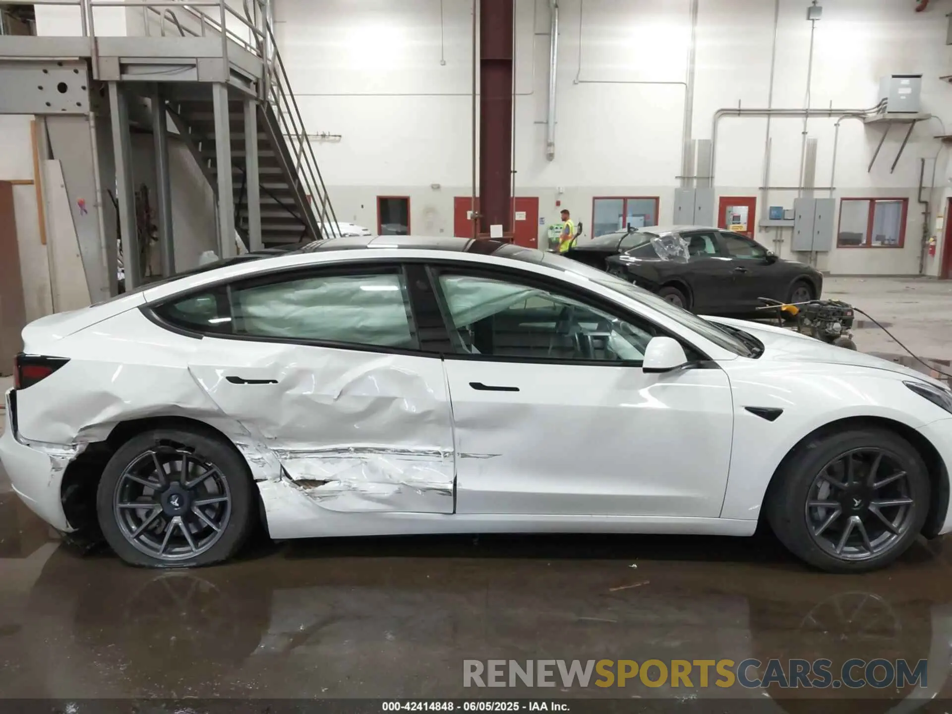 12 Photograph of a damaged car 5YJ3E1EB8MF995908 TESLA MODEL 3 2021
