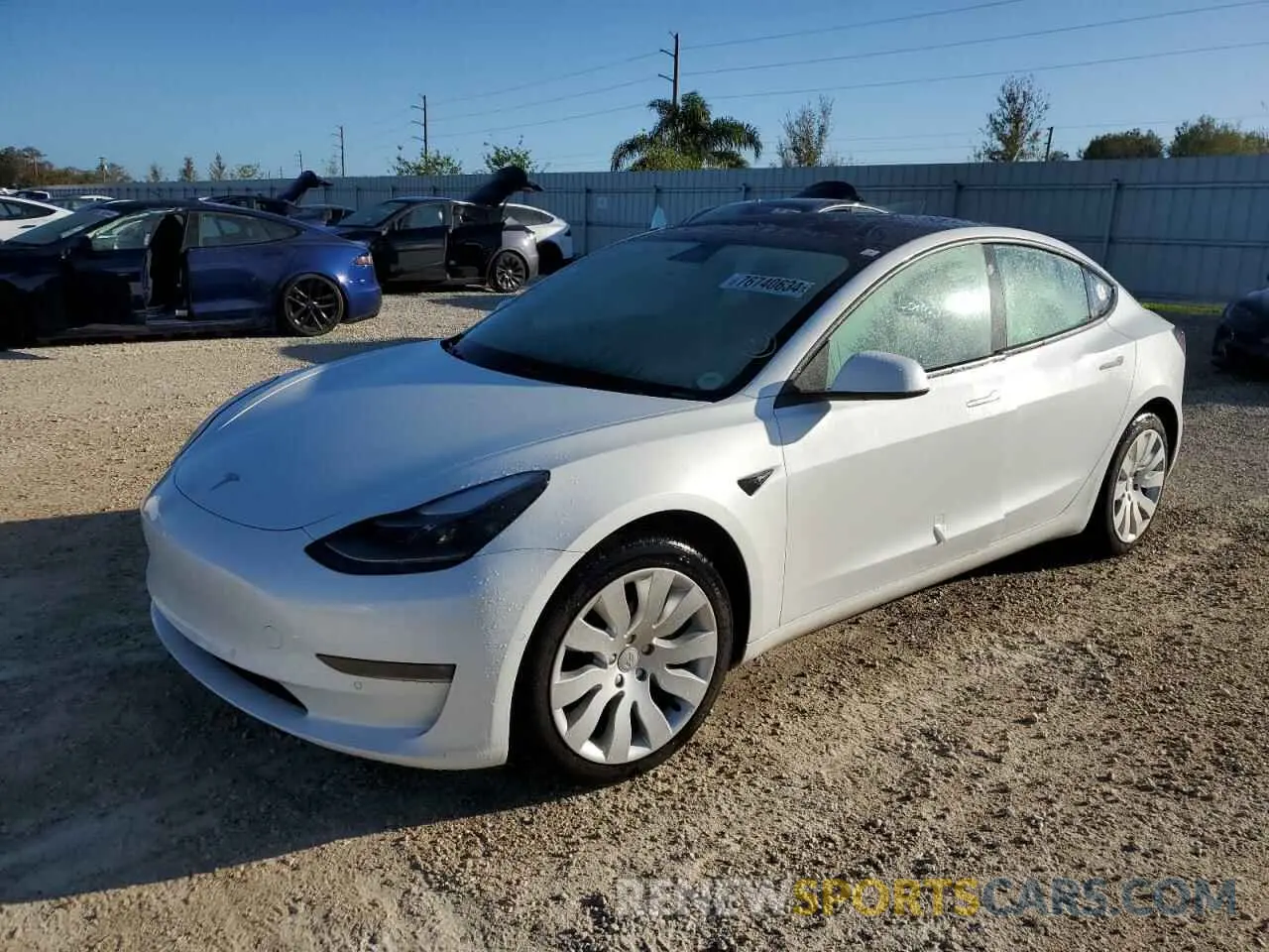 1 Photograph of a damaged car 5YJ3E1EB9MF094885 TESLA MODEL 3 2021