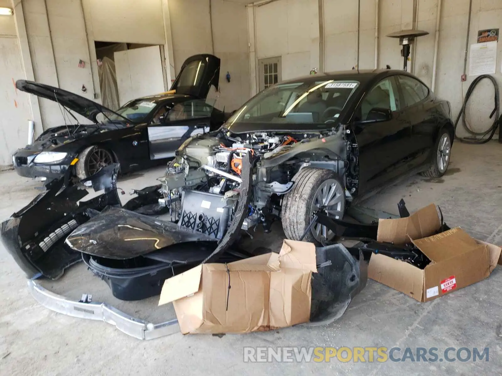2 Photograph of a damaged car 5YJ3E1EB9MF848822 TESLA MODEL 3 2021
