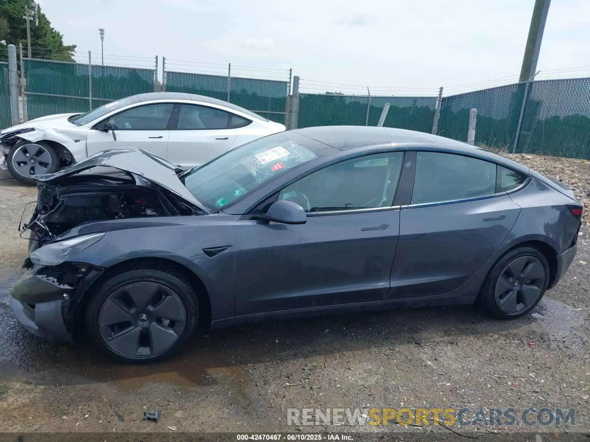 14 Photograph of a damaged car 5YJ3E1EB9MF924698 TESLA MODEL 3 2021