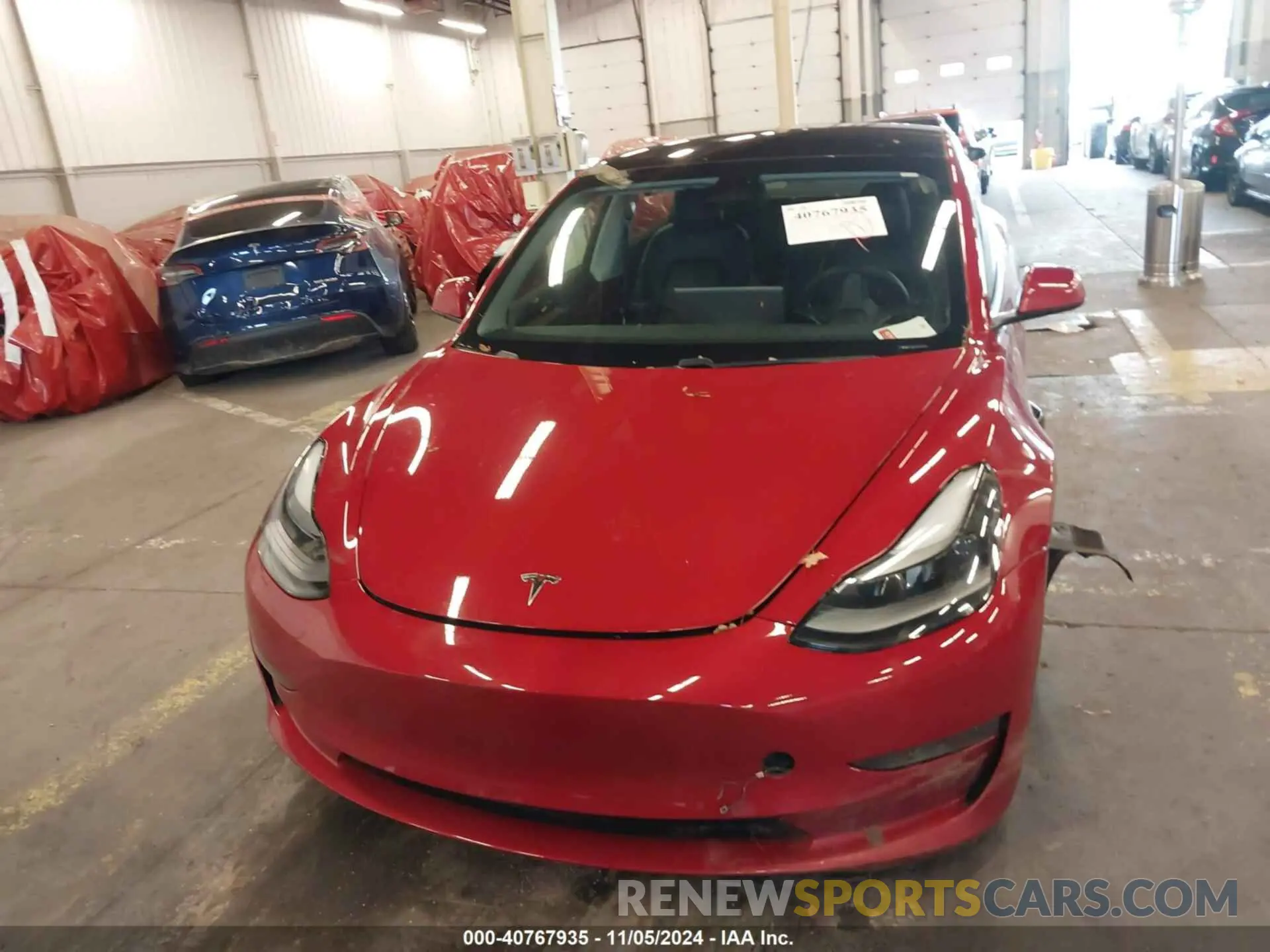 12 Photograph of a damaged car 5YJ3E1EBXMF013215 TESLA MODEL 3 2021
