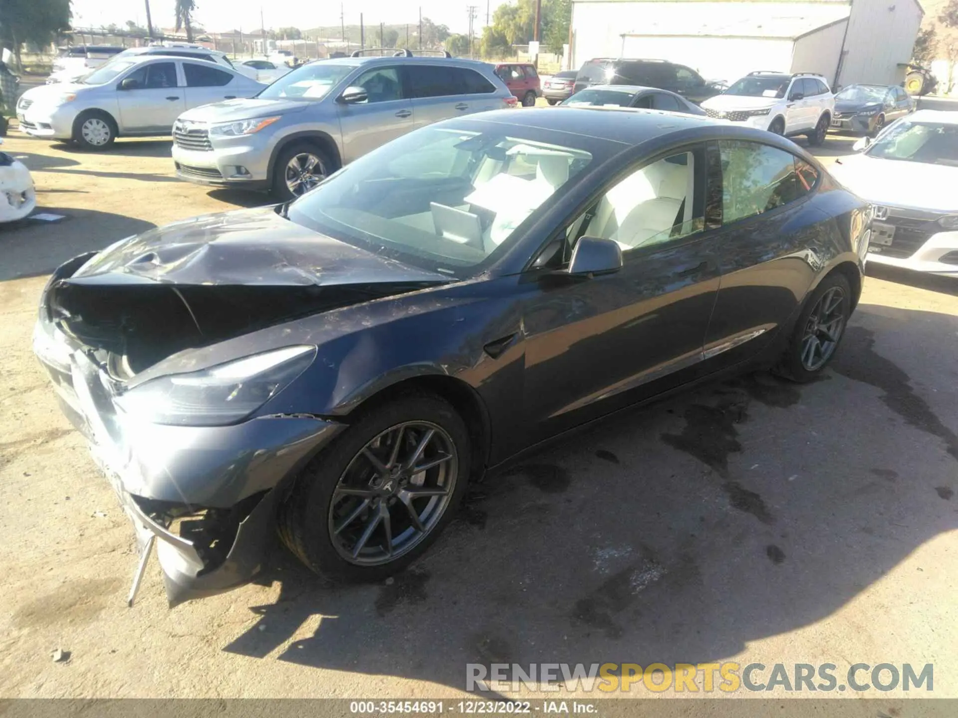 2 Photograph of a damaged car 5YJ3E1EBXMF875611 TESLA MODEL 3 2021