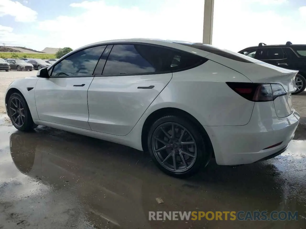 2 Photograph of a damaged car 5YJ3E1EBXMF993027 TESLA MODEL 3 2021