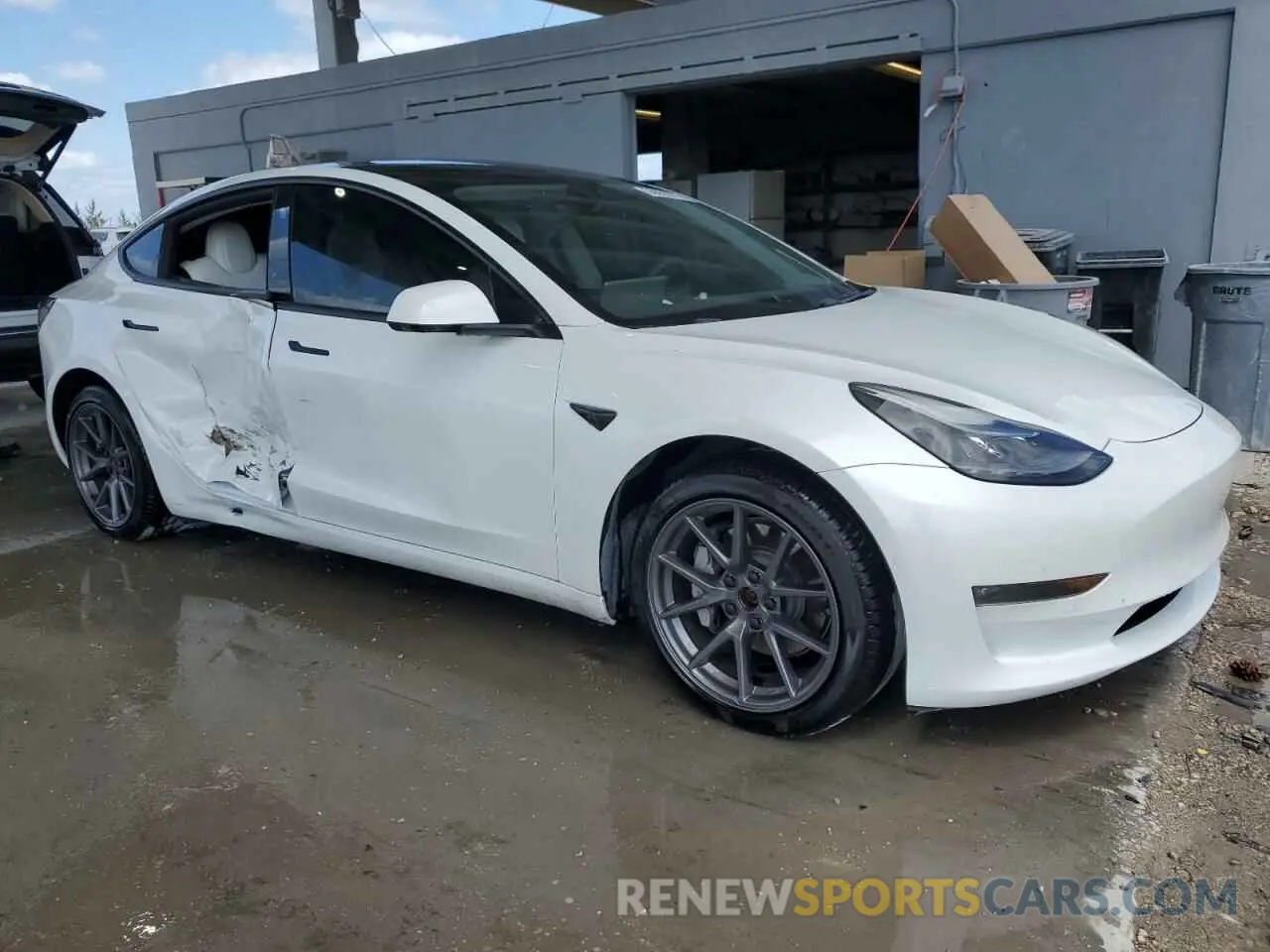 4 Photograph of a damaged car 5YJ3E1EBXMF993027 TESLA MODEL 3 2021