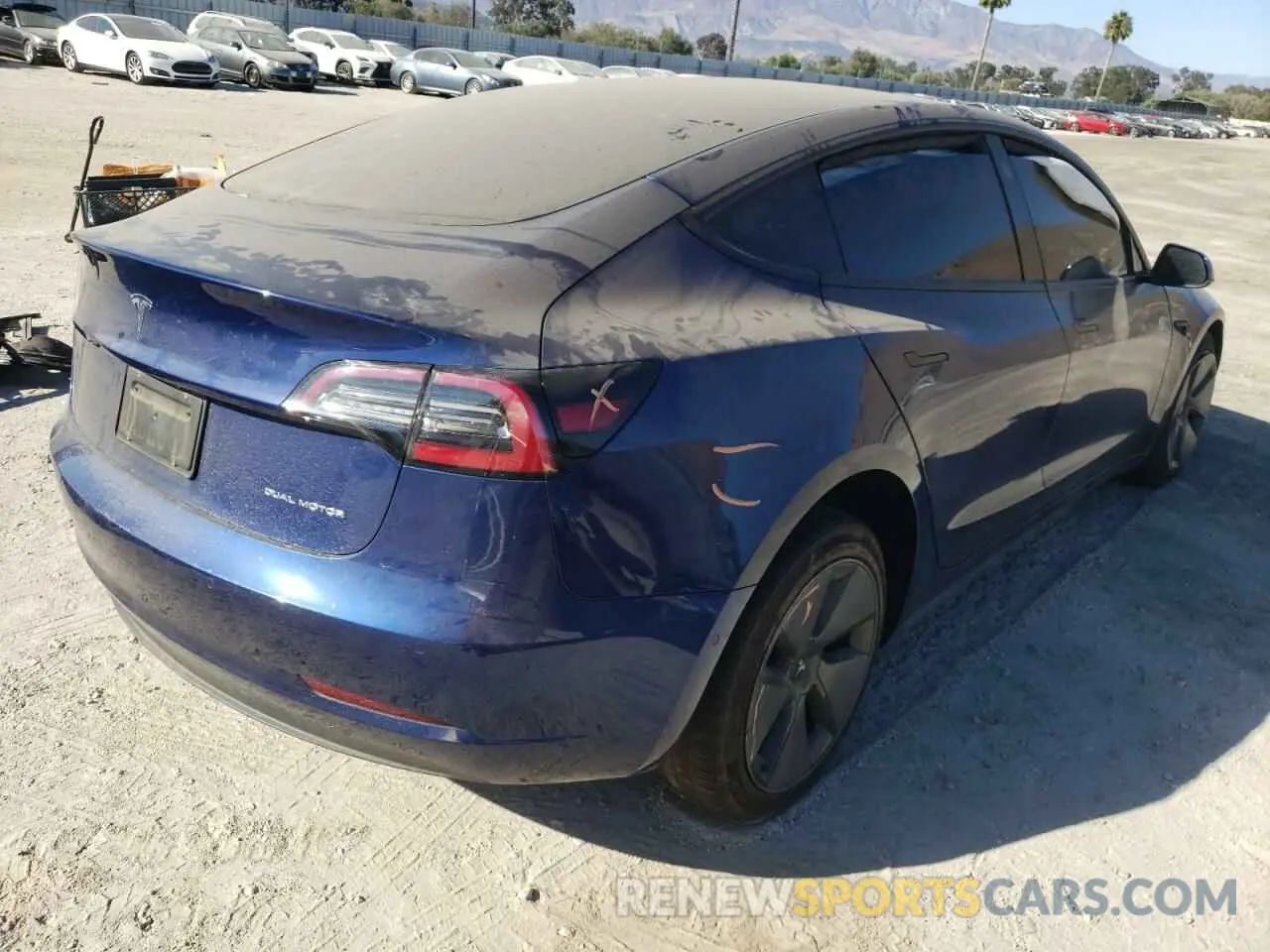4 Photograph of a damaged car 5YJ3E1EBXMF999815 TESLA MODEL 3 2021