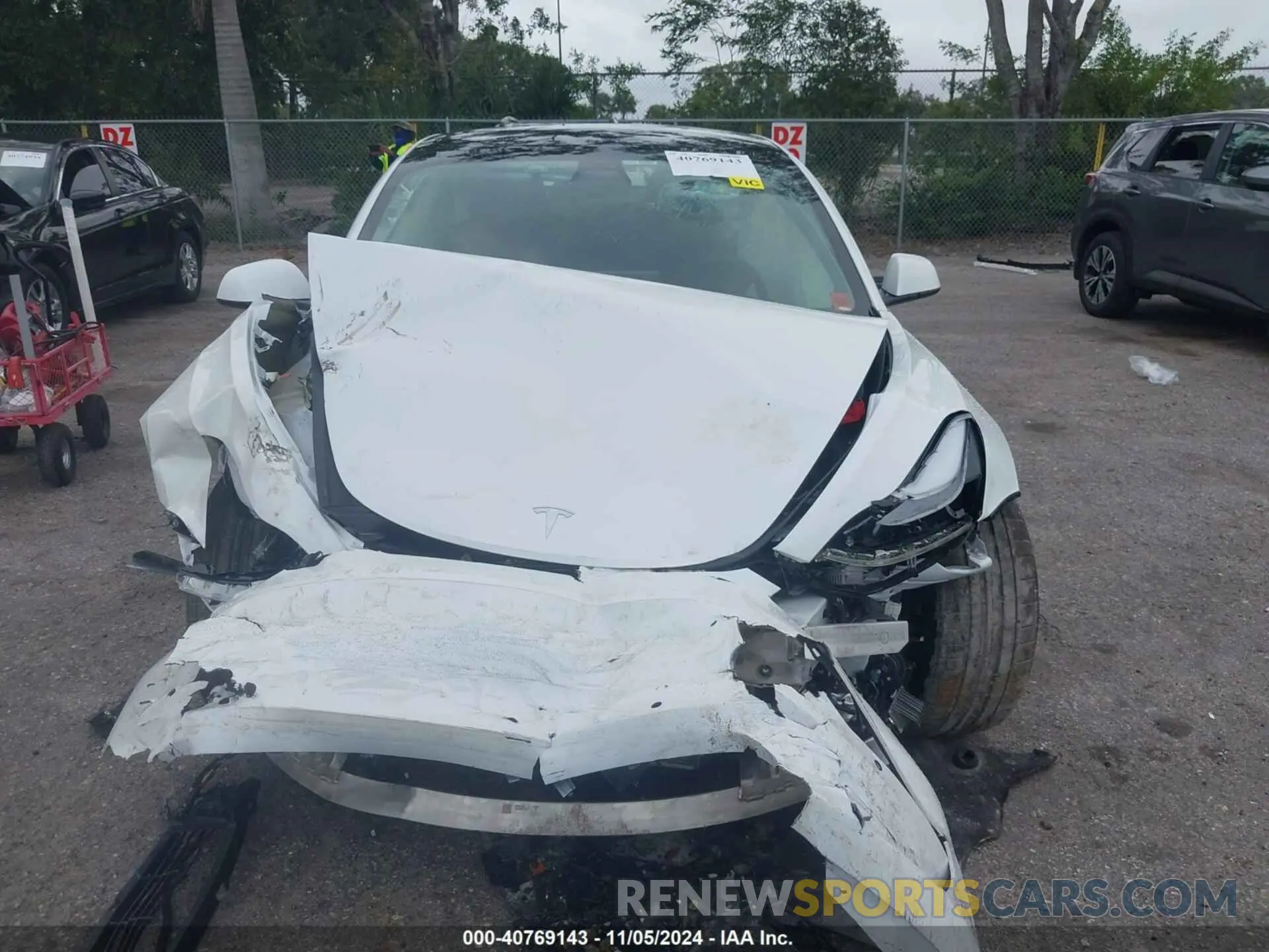 12 Photograph of a damaged car 5YJ3E1EC6MF991056 TESLA MODEL 3 2021