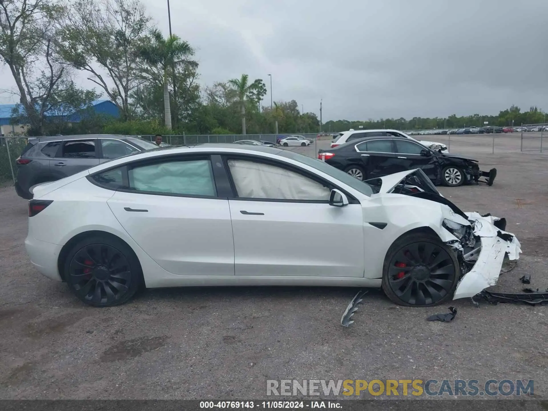 13 Photograph of a damaged car 5YJ3E1EC6MF991056 TESLA MODEL 3 2021