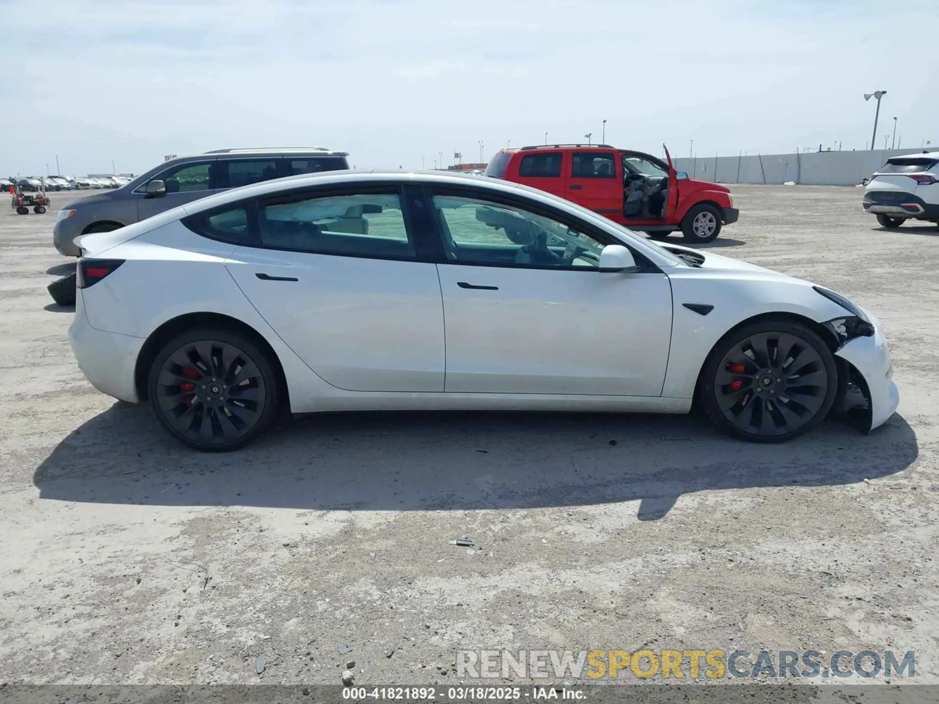 12 Photograph of a damaged car 5YJ3E1EC8MF044388 TESLA MODEL 3 2021