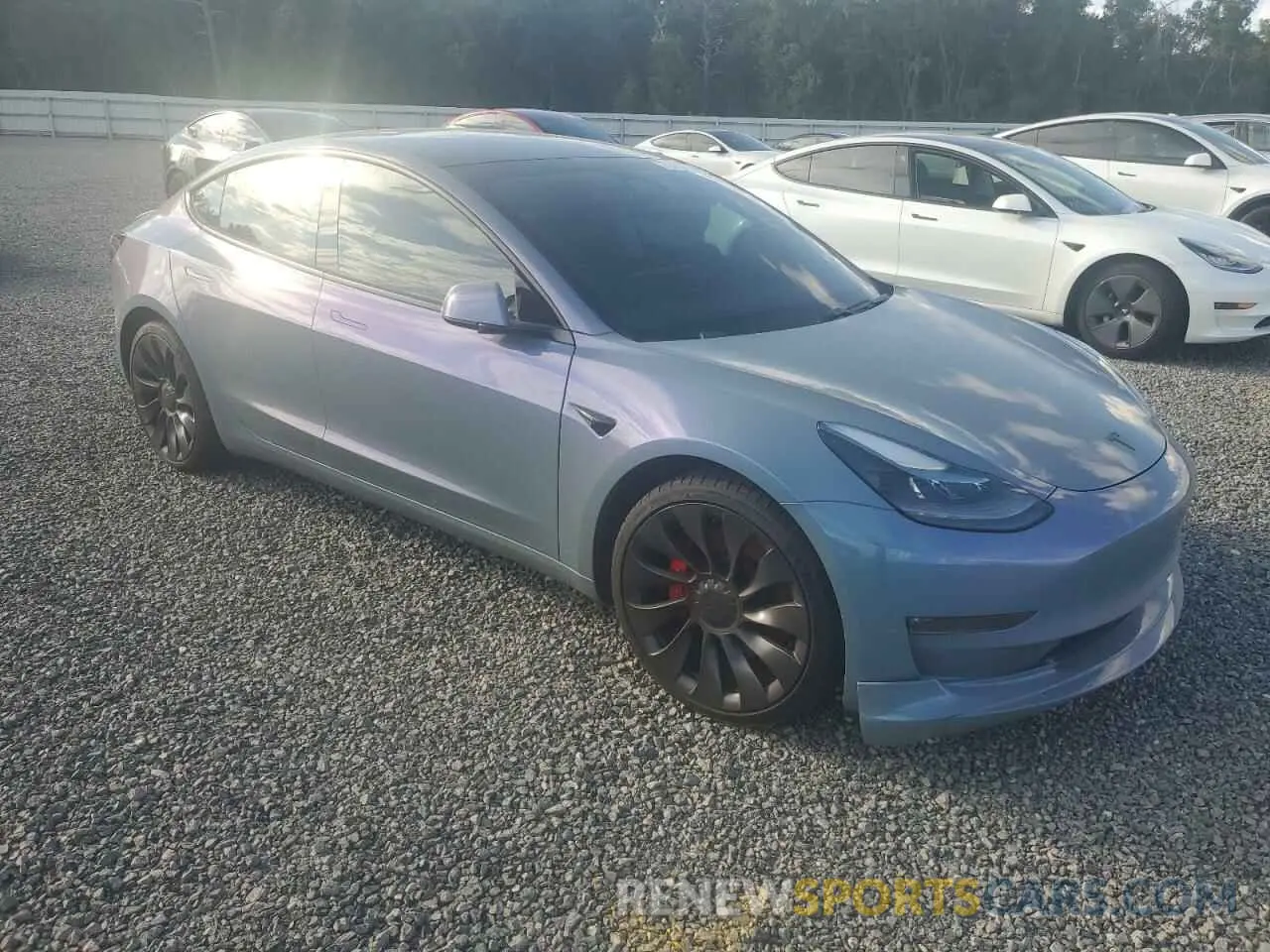 4 Photograph of a damaged car 5YJ3E1EC8MF056511 TESLA MODEL 3 2021