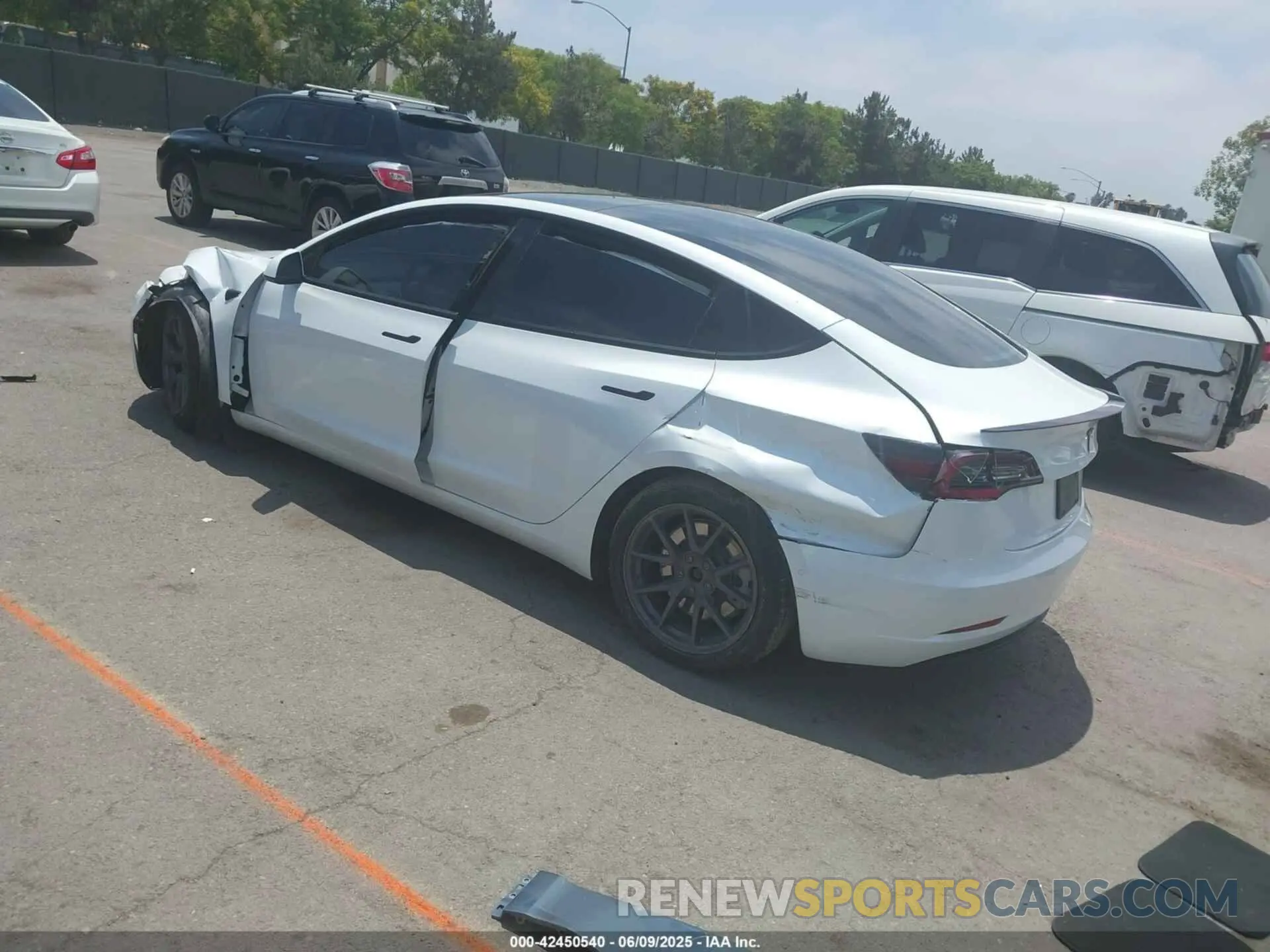 3 Фотография поврежденного автомобиля 5YJ3E1EA0NF102851 TESLA MODEL 3 2022
