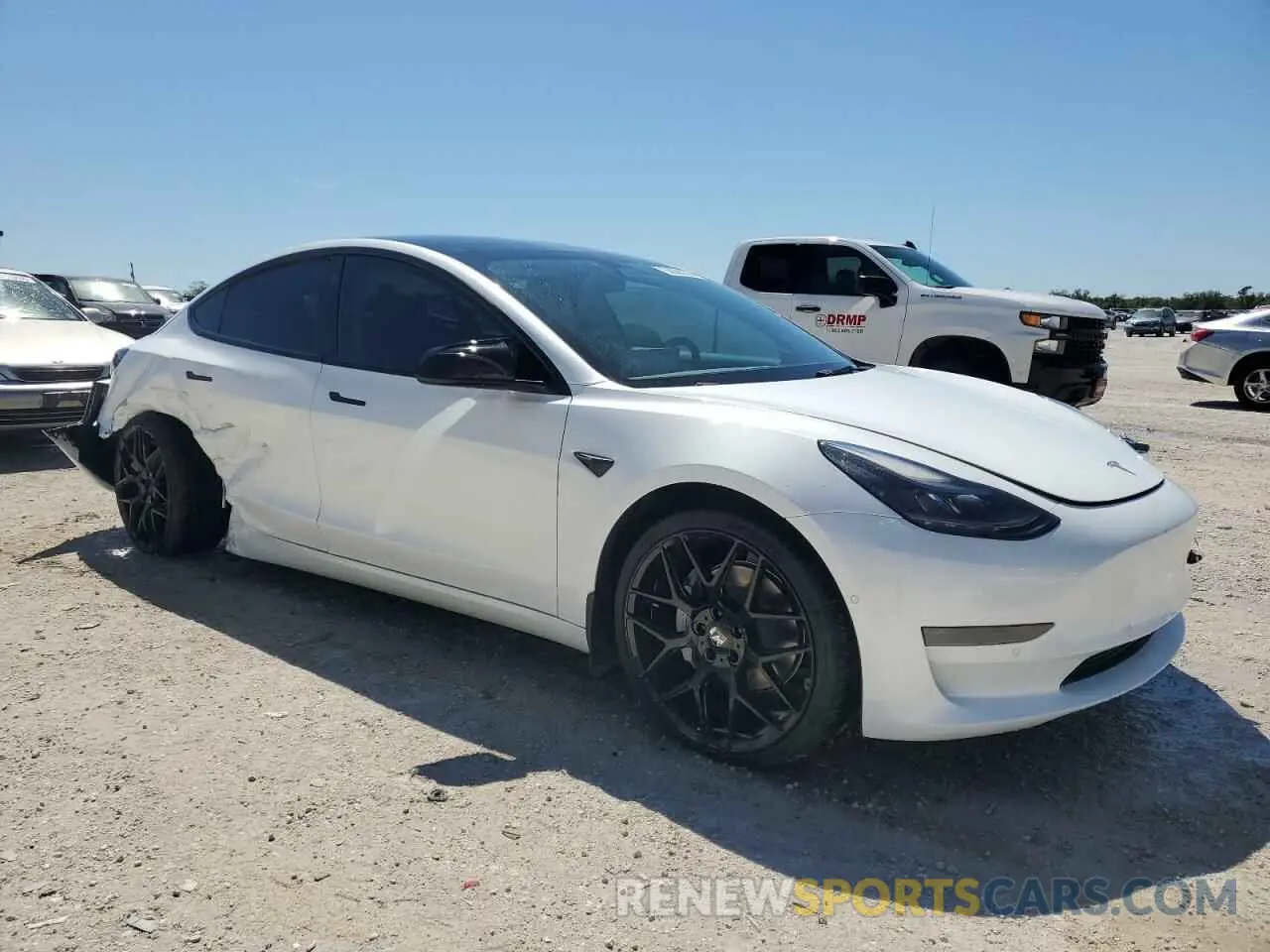 4 Photograph of a damaged car 5YJ3E1EA0NF108956 TESLA MODEL 3 2022