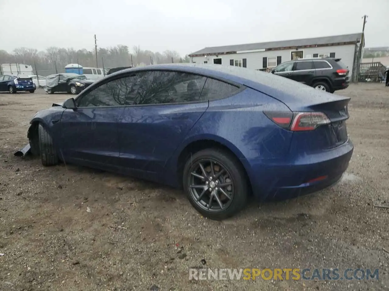 2 Photograph of a damaged car 5YJ3E1EA0NF185701 TESLA MODEL 3 2022