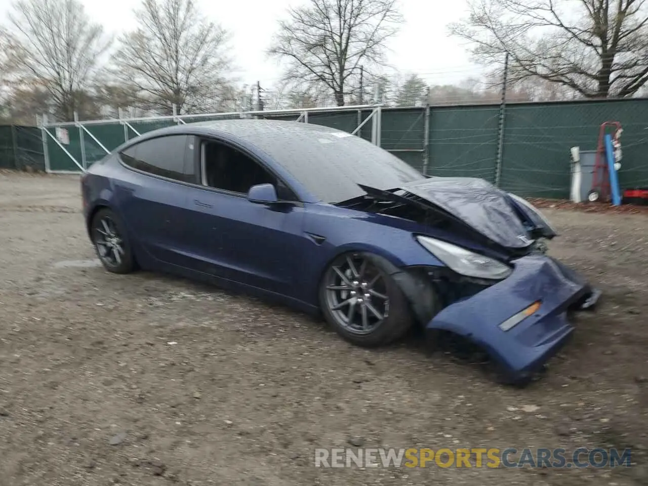 4 Photograph of a damaged car 5YJ3E1EA0NF185701 TESLA MODEL 3 2022