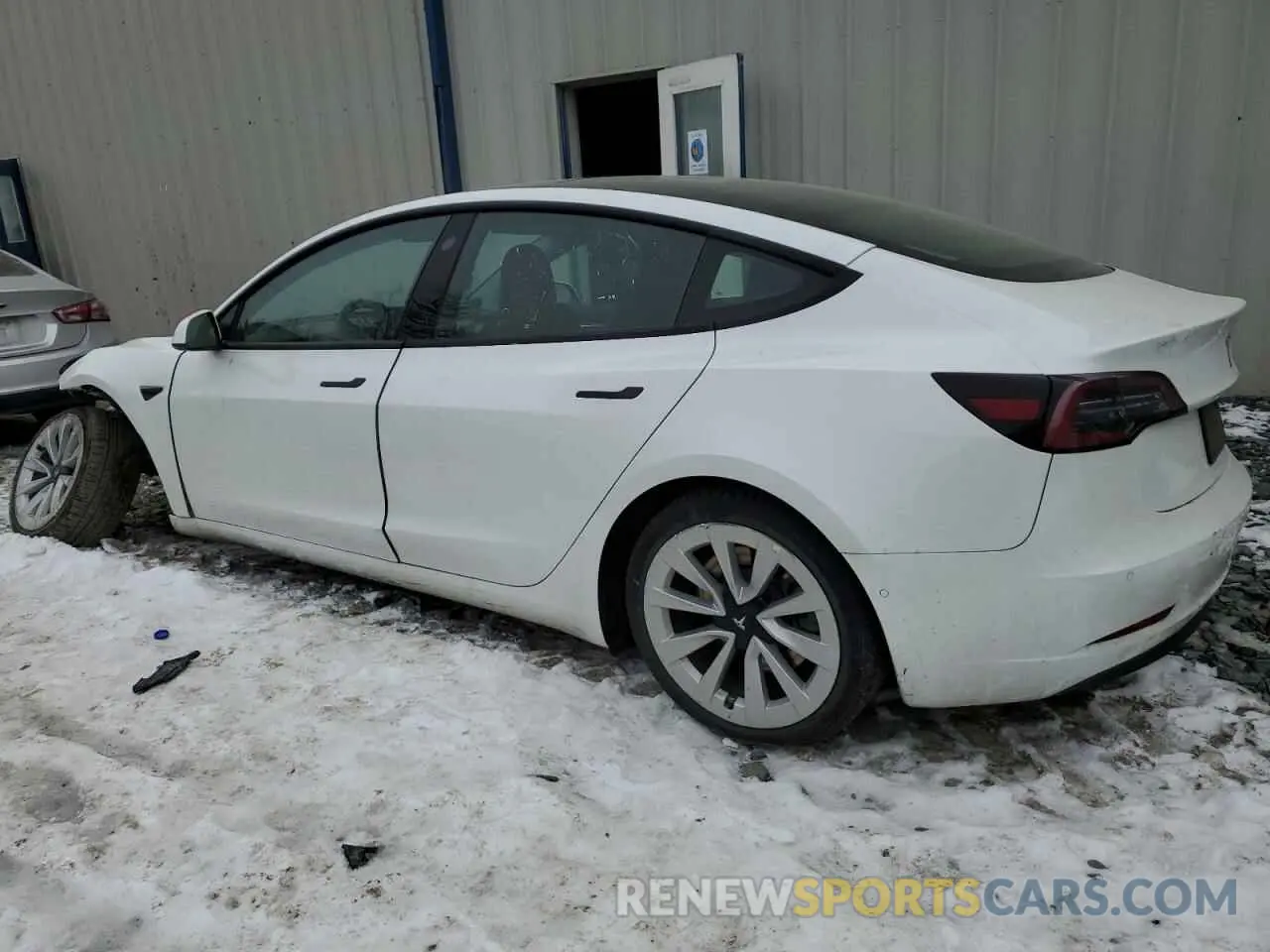 2 Photograph of a damaged car 5YJ3E1EA0NF186833 TESLA MODEL 3 2022