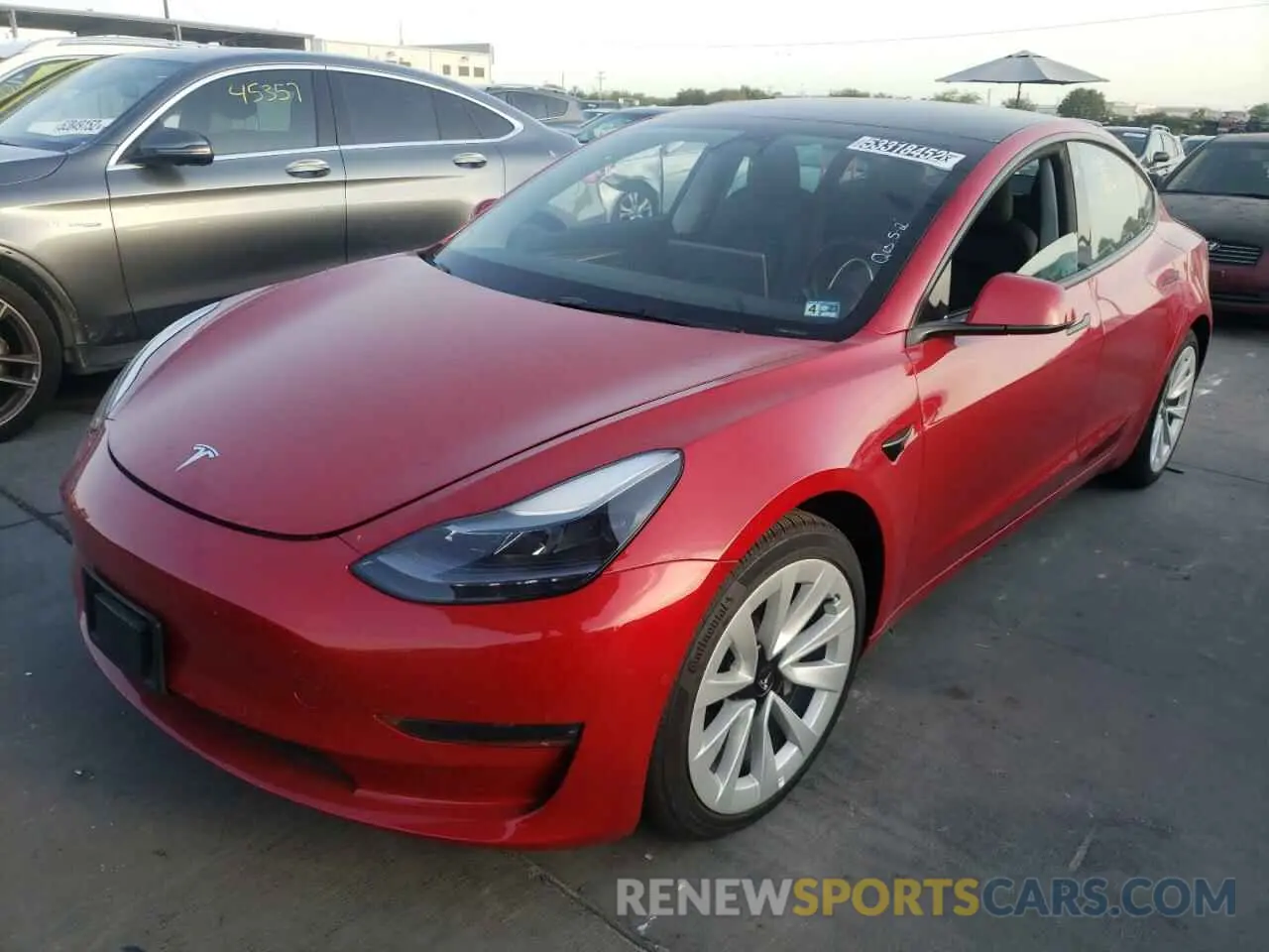 2 Photograph of a damaged car 5YJ3E1EA0NF188906 TESLA MODEL 3 2022