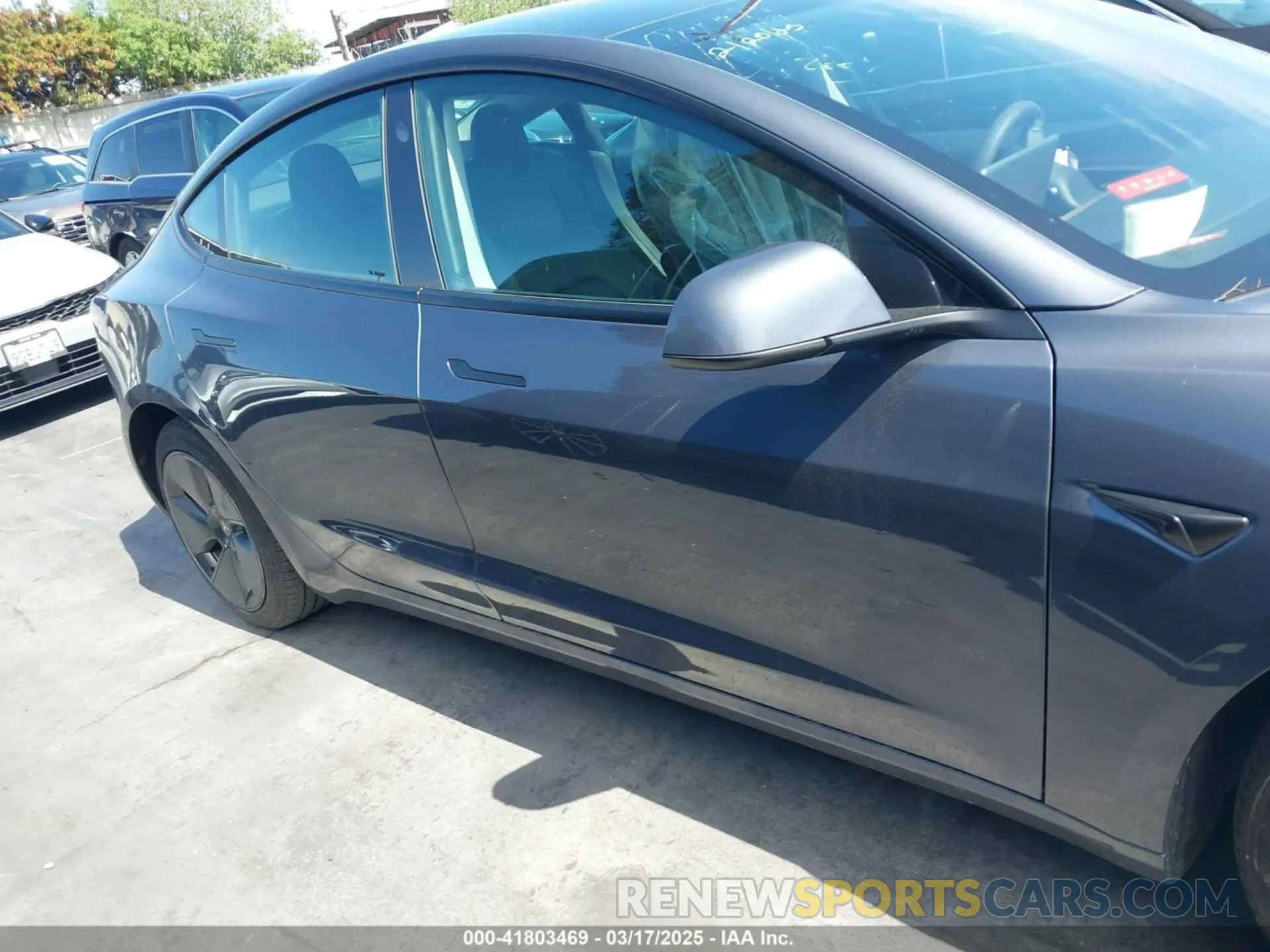 12 Photograph of a damaged car 5YJ3E1EA0NF344782 TESLA MODEL 3 2022