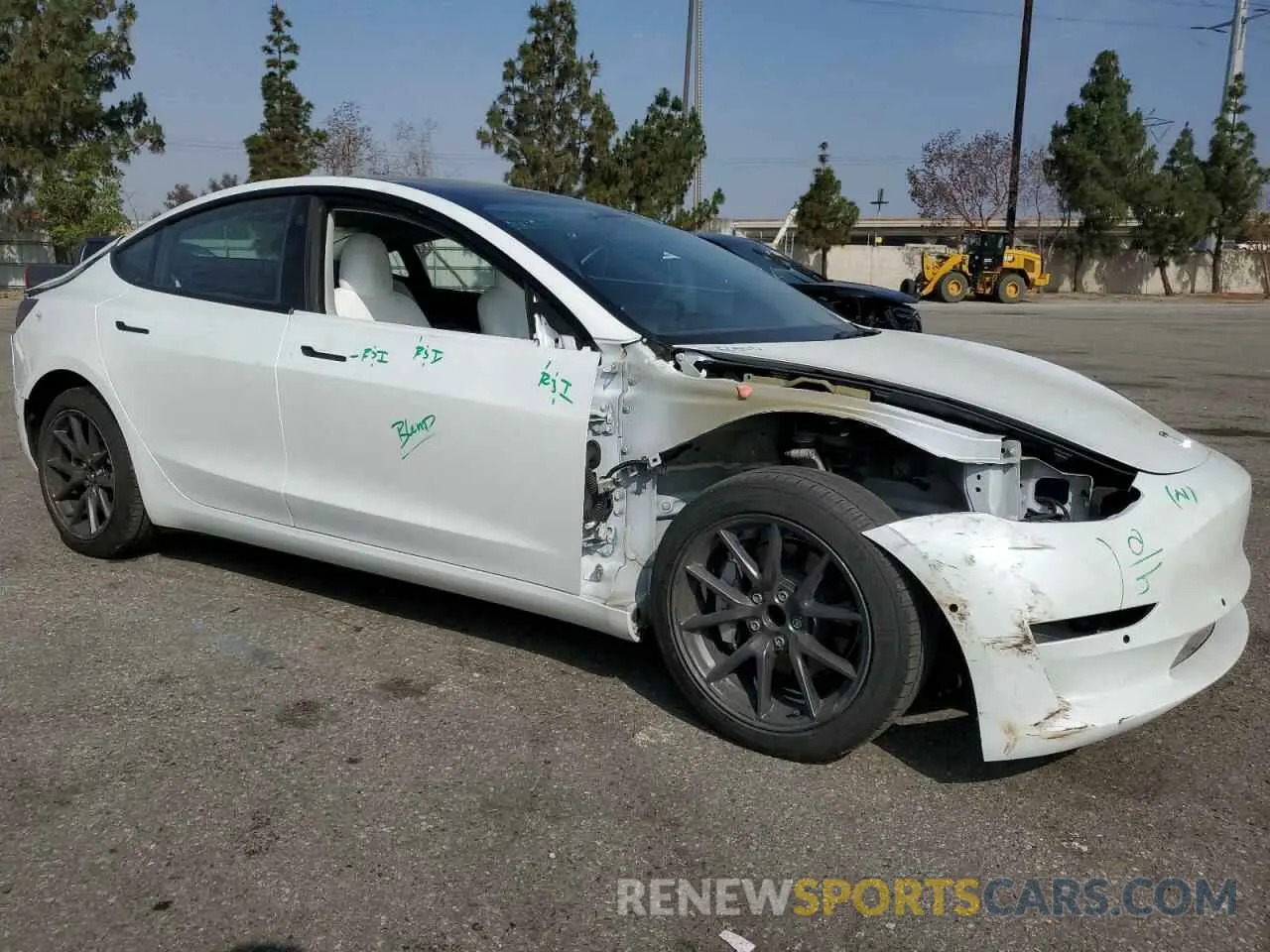 4 Фотография поврежденного автомобиля 5YJ3E1EA0NF360111 TESLA MODEL 3 2022