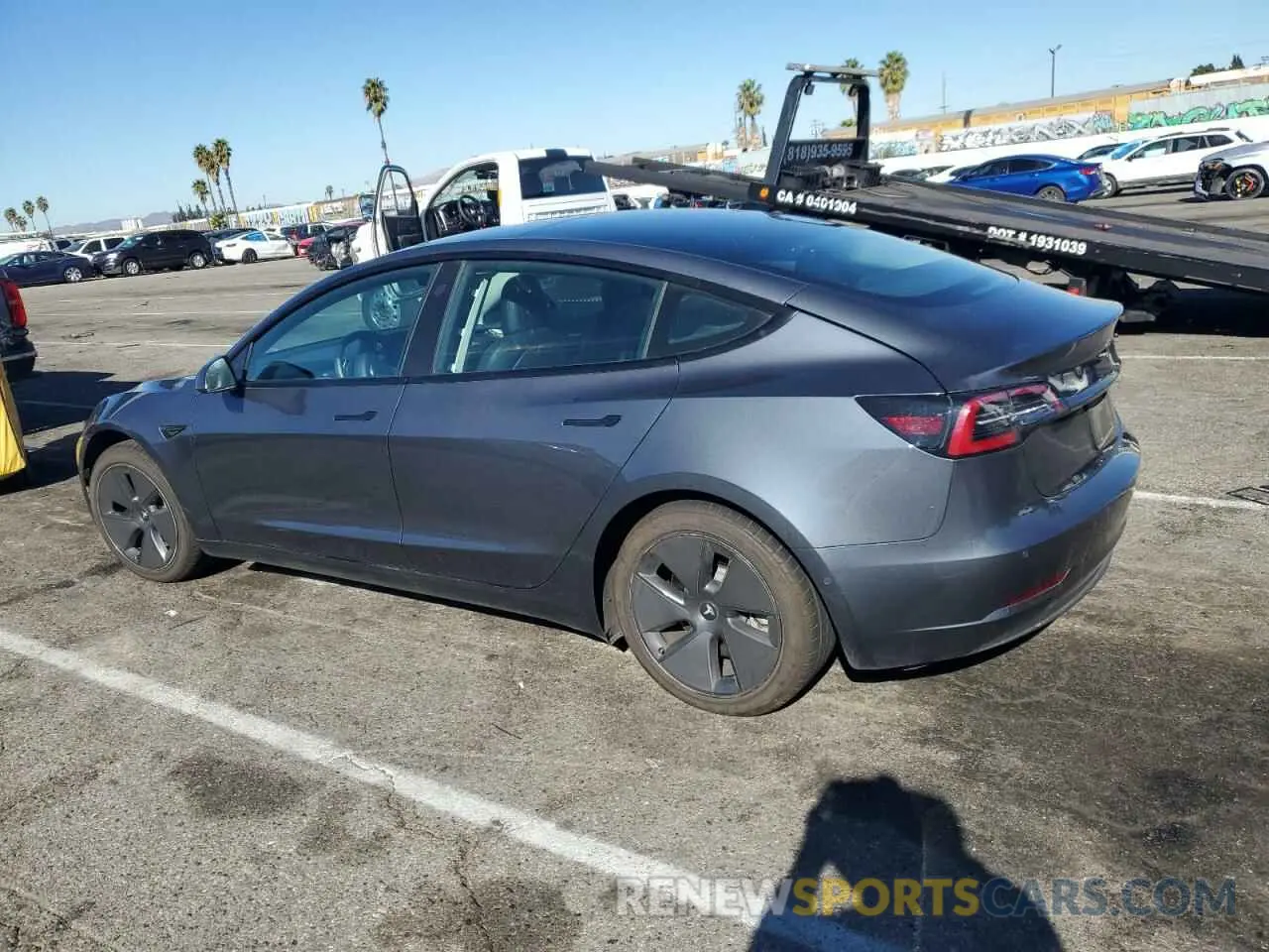 2 Photograph of a damaged car 5YJ3E1EA0NF372498 TESLA MODEL 3 2022