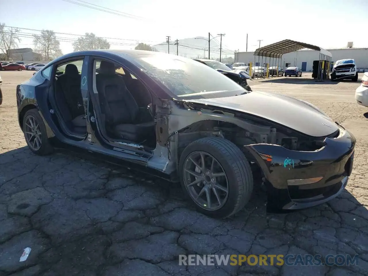4 Photograph of a damaged car 5YJ3E1EA1NF115575 TESLA MODEL 3 2022