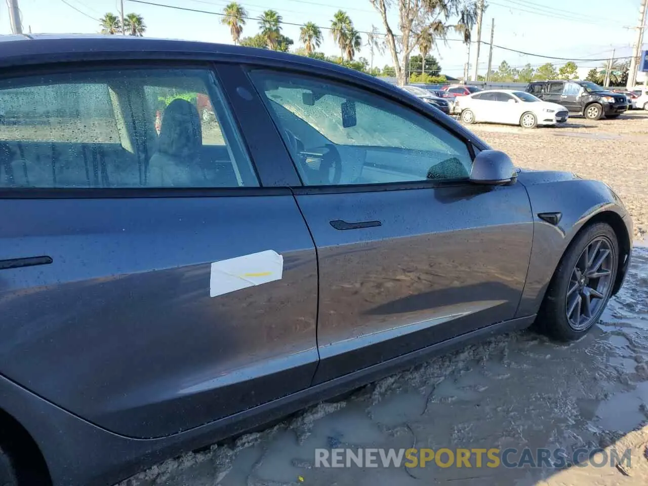 12 Photograph of a damaged car 5YJ3E1EA1NF187621 TESLA MODEL 3 2022