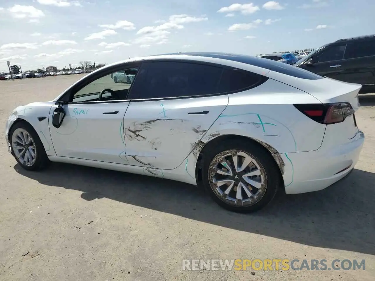 2 Photograph of a damaged car 5YJ3E1EA1NF303660 TESLA MODEL 3 2022