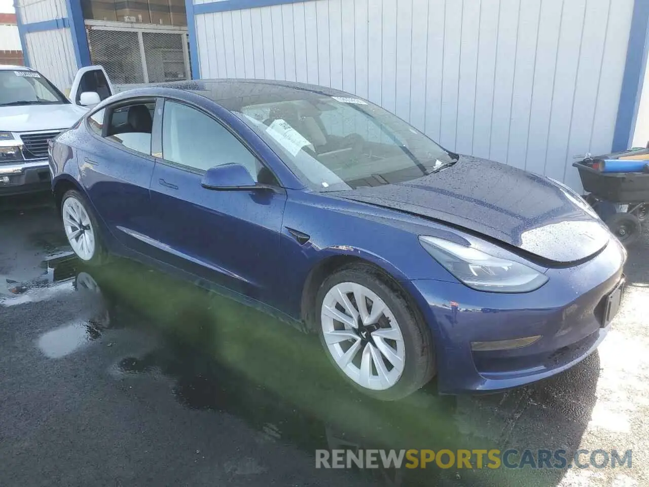 4 Photograph of a damaged car 5YJ3E1EA1NF370467 TESLA MODEL 3 2022