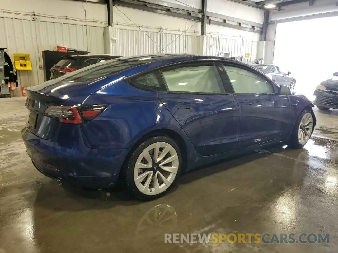 3 Photograph of a damaged car 5YJ3E1EA1NF371070 TESLA MODEL 3 2022