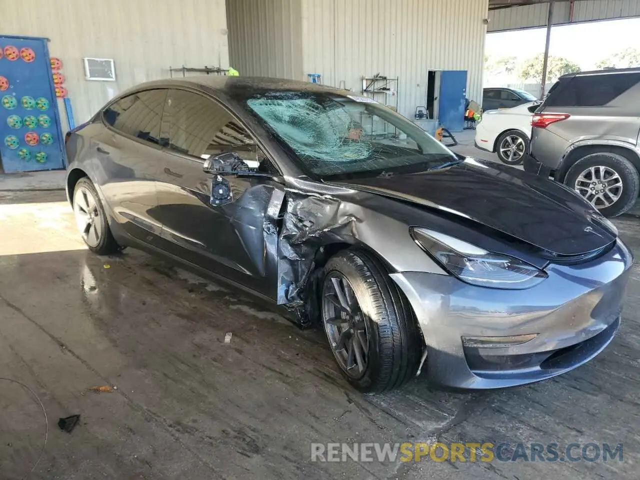 4 Photograph of a damaged car 5YJ3E1EA2NF332293 TESLA MODEL 3 2022