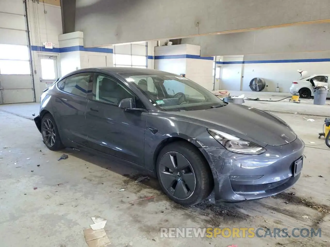 4 Photograph of a damaged car 5YJ3E1EA3NF370048 TESLA MODEL 3 2022