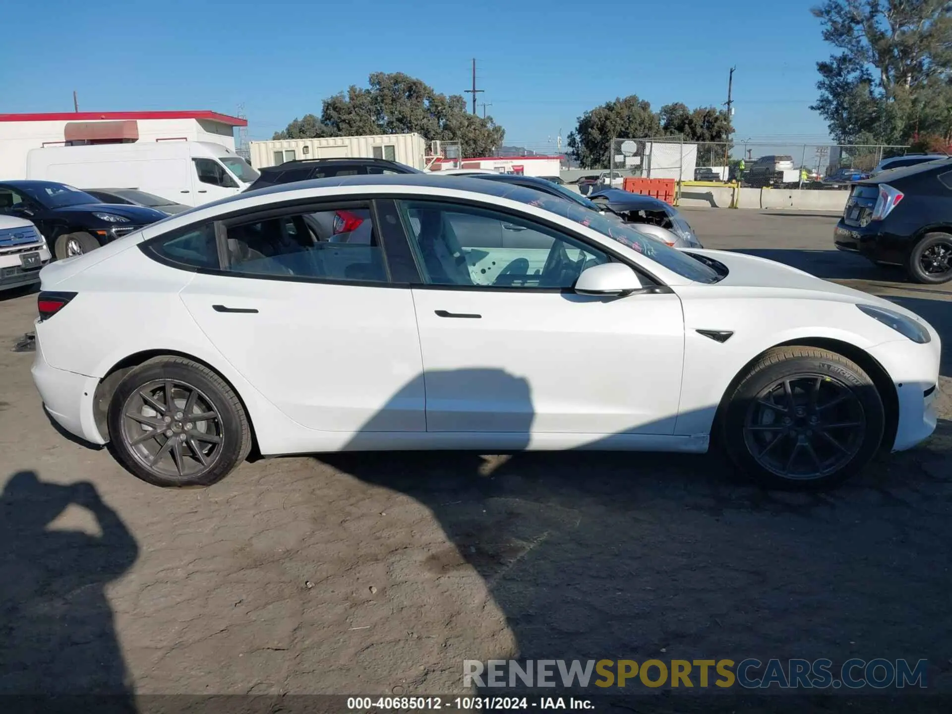 13 Photograph of a damaged car 5YJ3E1EA4NF104389 TESLA MODEL 3 2022