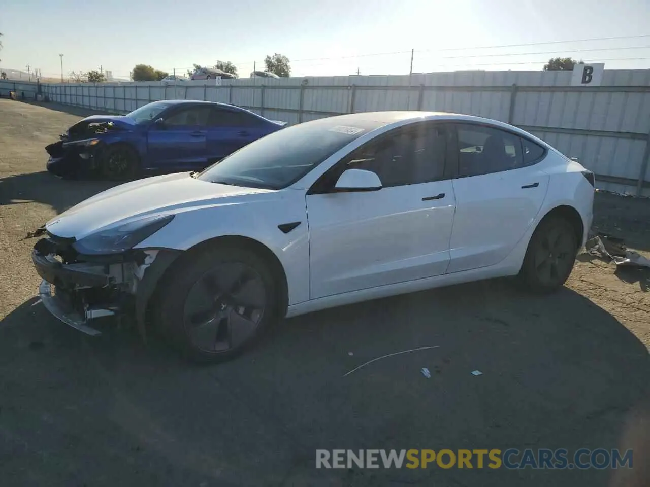 1 Photograph of a damaged car 5YJ3E1EA4NF238433 TESLA MODEL 3 2022