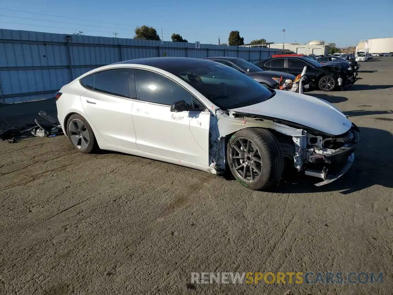 4 Photograph of a damaged car 5YJ3E1EA4NF238433 TESLA MODEL 3 2022