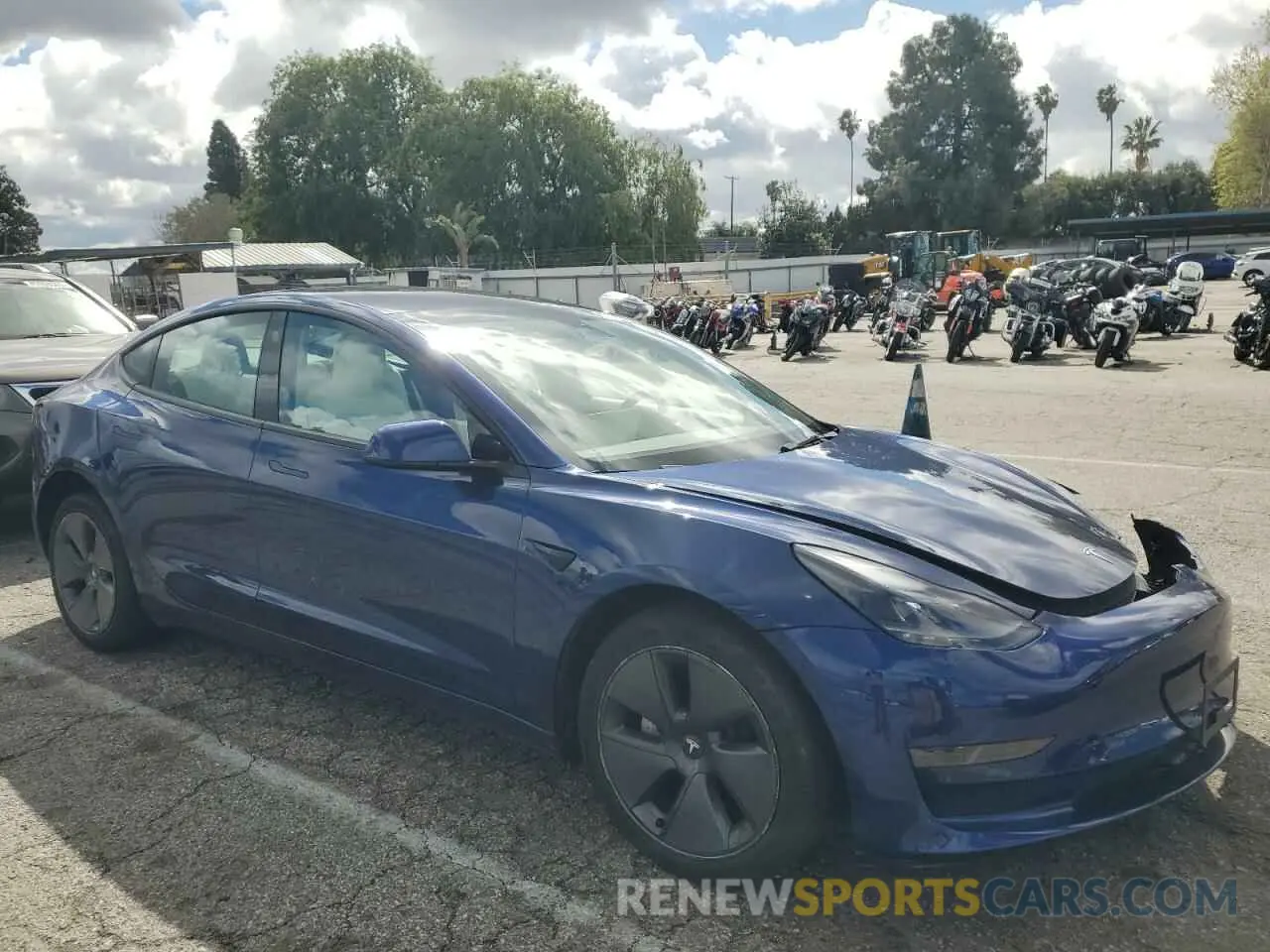 4 Photograph of a damaged car 5YJ3E1EA4NF248458 TESLA MODEL 3 2022