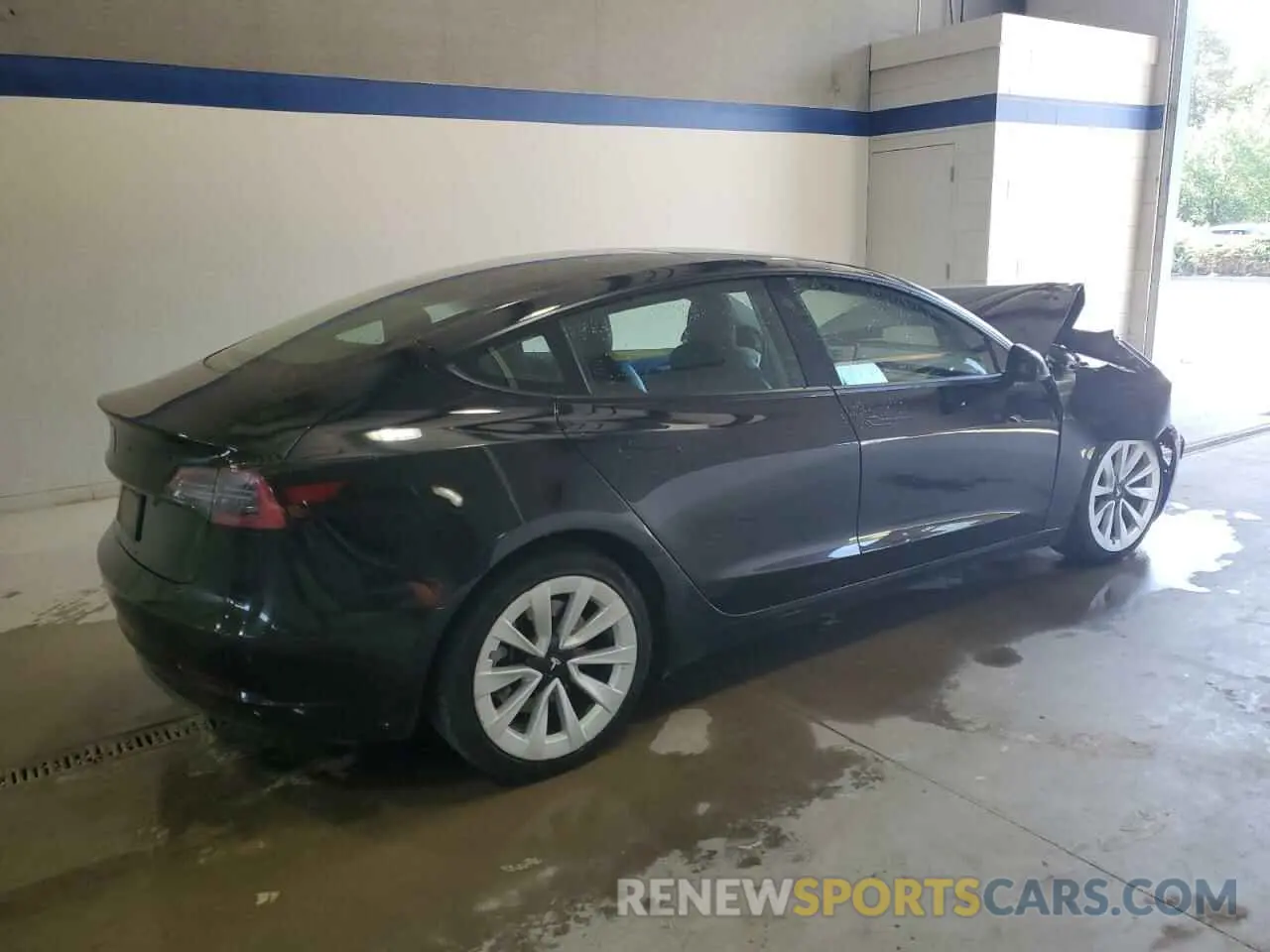 3 Photograph of a damaged car 5YJ3E1EA4NF304611 TESLA MODEL 3 2022