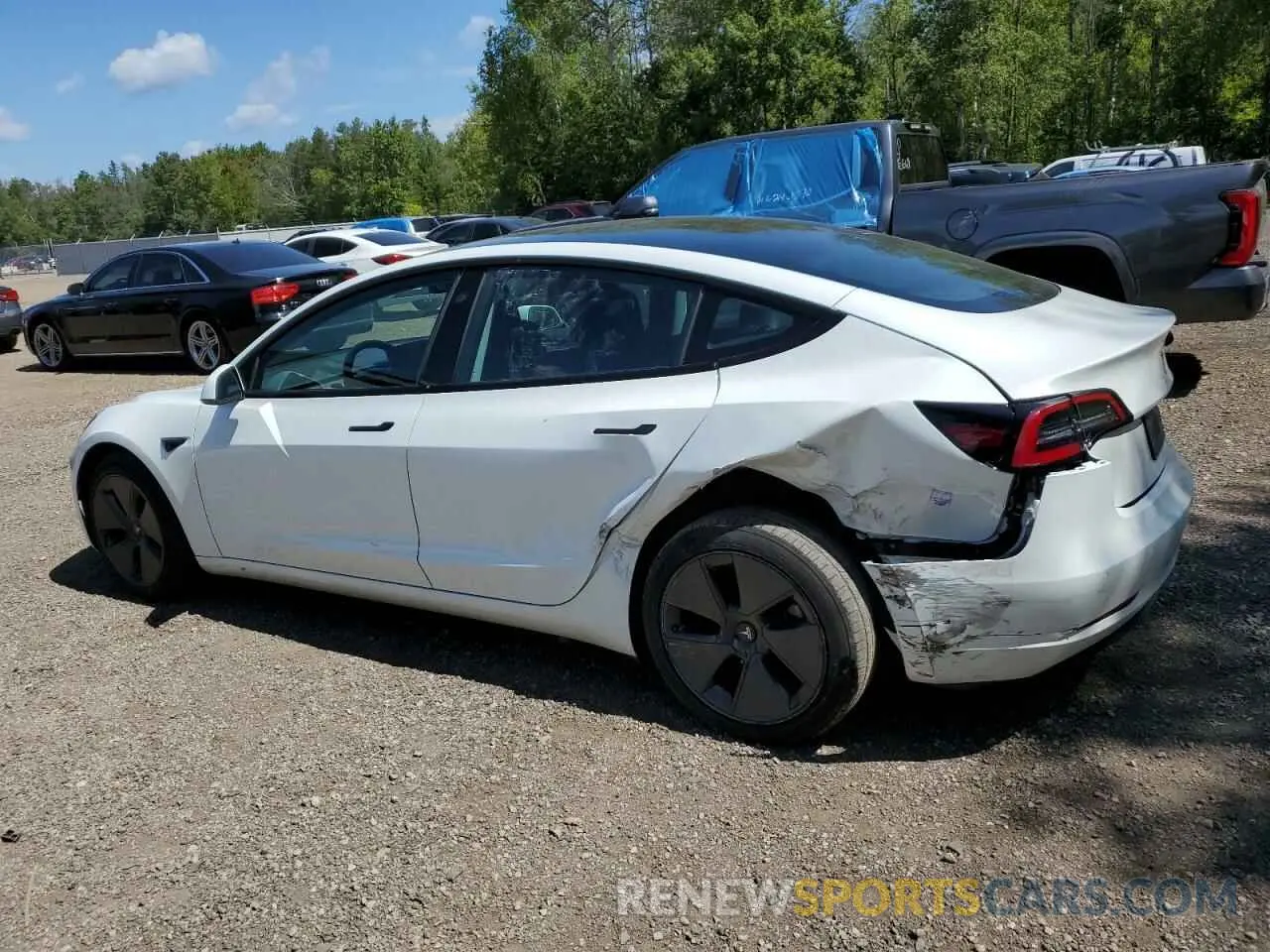 2 Photograph of a damaged car 5YJ3E1EA4NF340377 TESLA MODEL 3 2022
